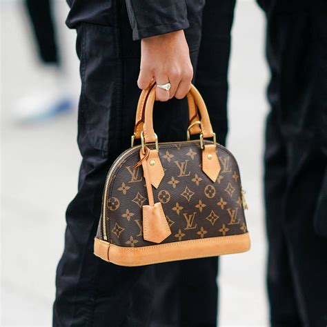 louis vuitton twist pm bag|louis vuitton alma tote bag.